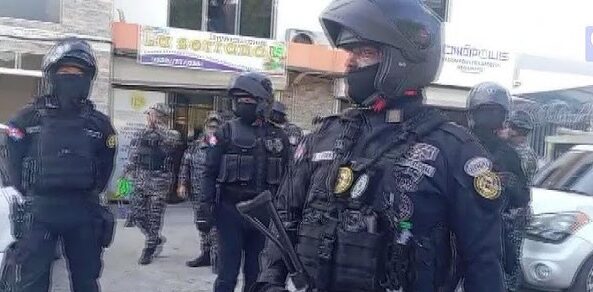 4 policías a prisión y 7 bajo fianza por ejecutar a 5 hombres en plaza de Santiago, RD