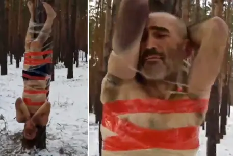 Los comandantes de Putin atan a soldados semidesnudos acusados de deserción a árboles en brutales imágenes de tortura